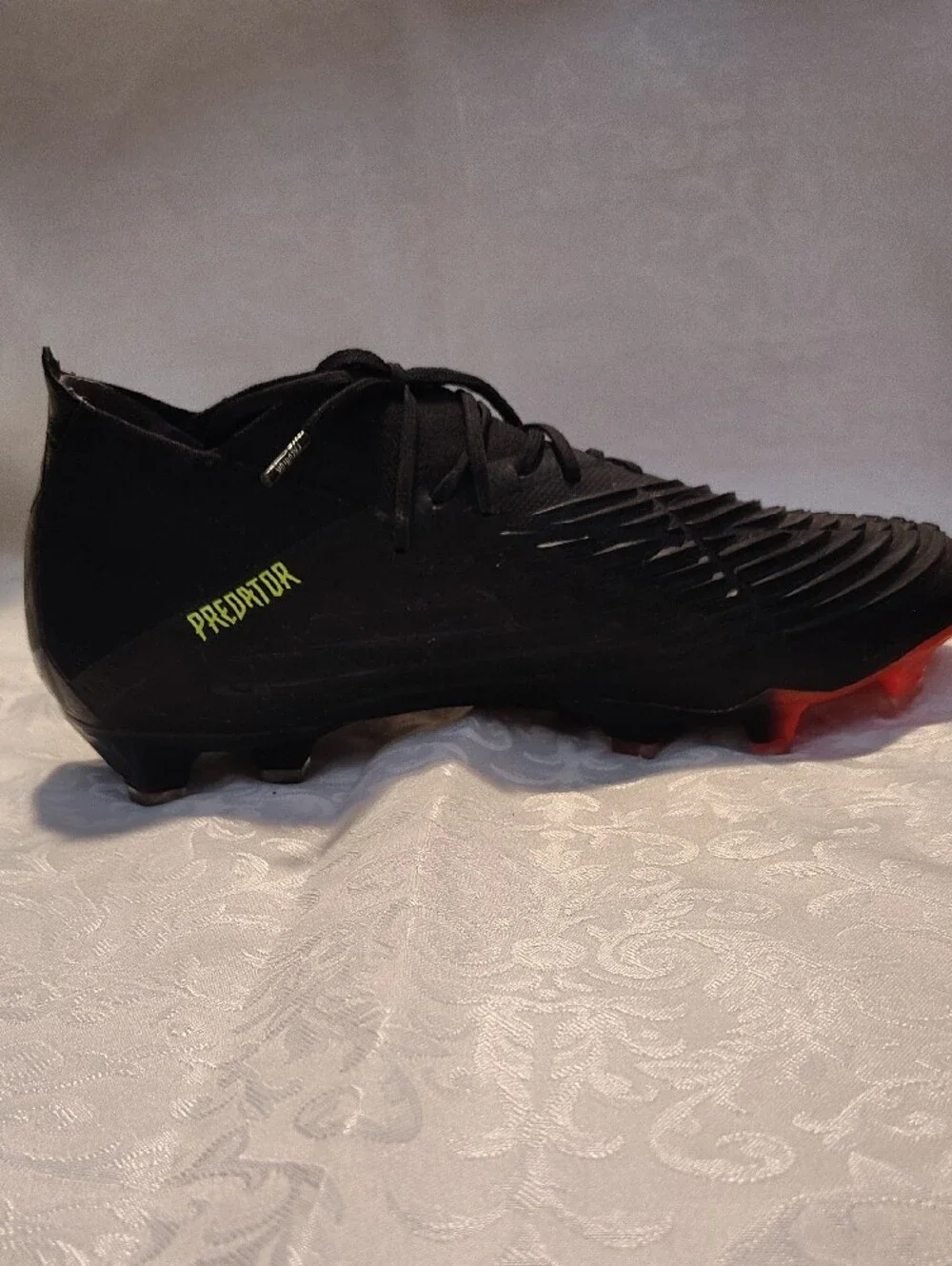 Adidas Men’s Black Soccer Cleats with Neon Yellow Stripes